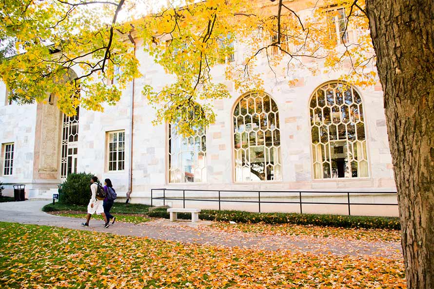 Convocation Hall at Emory with yellow and green fall leaves in the foreground